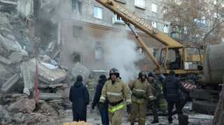 Hunt for survivors as Putin rushes to scene of deadly high-rise blast