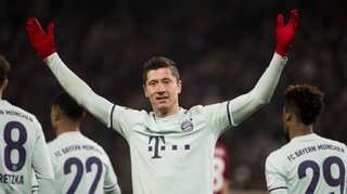 Lewandowski misses the fans as Bayern clinch title behind closed doors