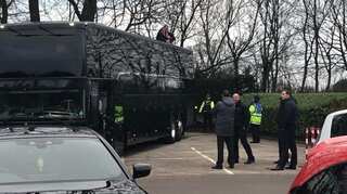 Blackpool fan protests on roof of Arsenal team bus