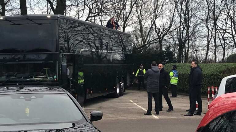 Blackpool fan protests on roof of Arsenal team bus
