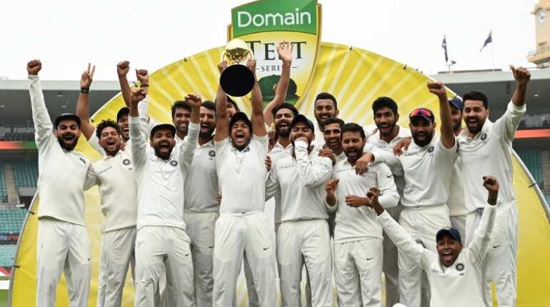 India lifts the trophy