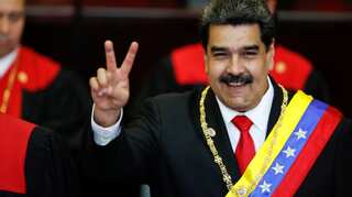 Venezuela's President Maduro starts new term, shrugs off criticism