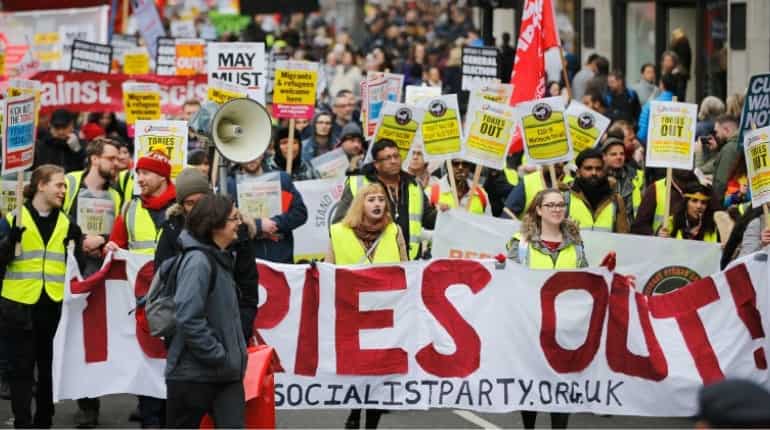Hundreds of 'yellow vest' protesters rally in central London