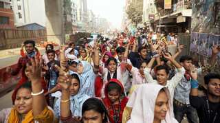 Bangladesh garment workers reject wage hike, walk off job