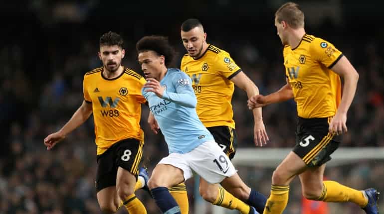 Manchester City ease past 10-man Wolves to cut gap at top Manchester City ease past 10-man Wolves to cut gap at top