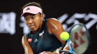 Naomi Osaka clubs her way into Australian Open second round