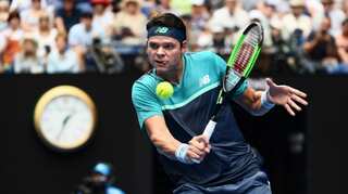 Australian Open: Milos Raonic edges past Stan Wawrinka in four-set thriller