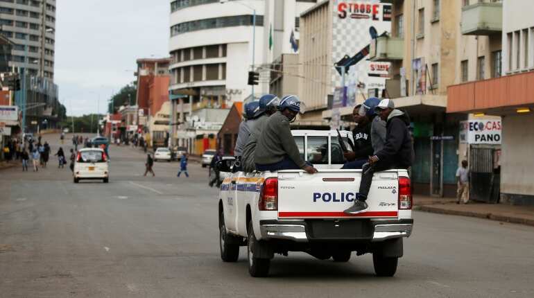 Zimbabwe union leader turns himself in to police after protests