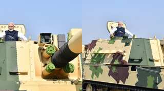 Modi boards tank at L&T's gun-making facility in Gujarat