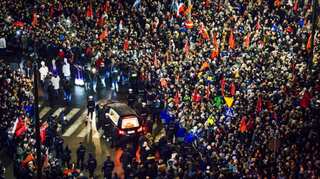 In tears and shock, Poland bids farewell to murdered mayor