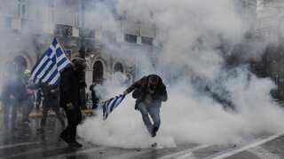 Clashes in Athens as tens of thousands protest Macedonian name deal