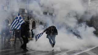 Clashes in Athens as tens of thousands protest Macedonian name deal