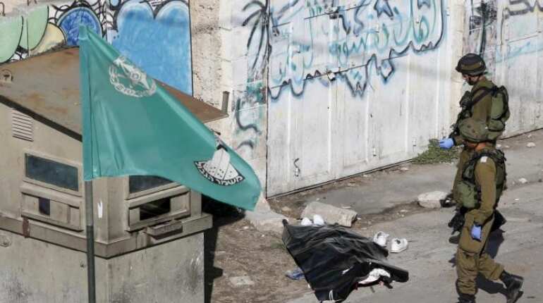 Palestinian shot dead while trying to stab Israeli soldier: Army Palestinian shot dead while trying to stab Israeli soldier: Army