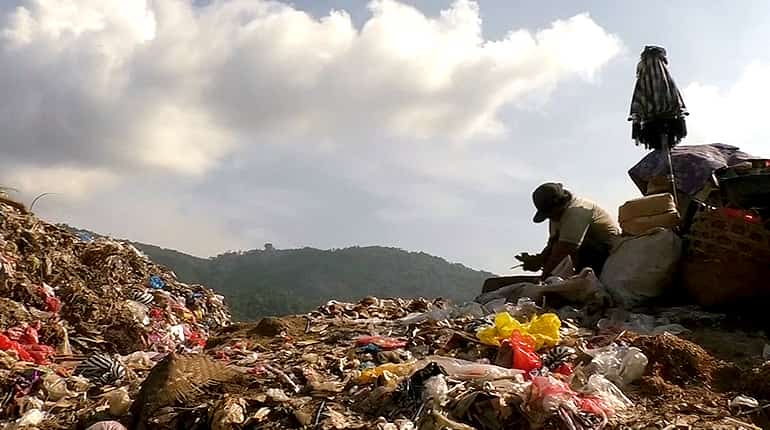 Plastic waste fills Indonesian river and 'never stops coming'