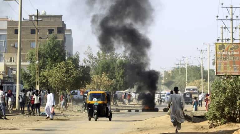 One killed as thousands protest across Sudan demanding president's resignation One killed as thousands protest across Sudan demanding president's resignation