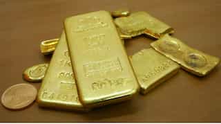 Gold holds firm as Evergrande crisis offsets firmer dollar, yields