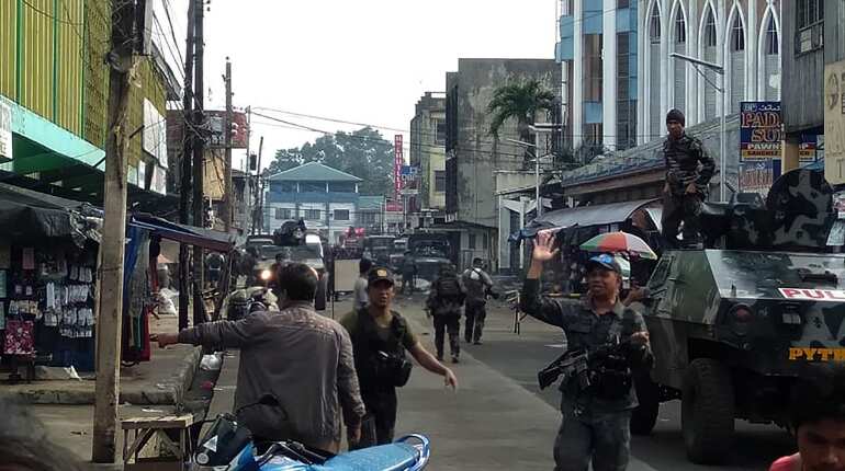 At least 18 dead in twin bomb attack on Philippines church At least 18 dead in twin bomb attack on Philippines church