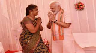 PM Modi meets Mudra entrepreneur Arulmozhi Saravanan in Madurai