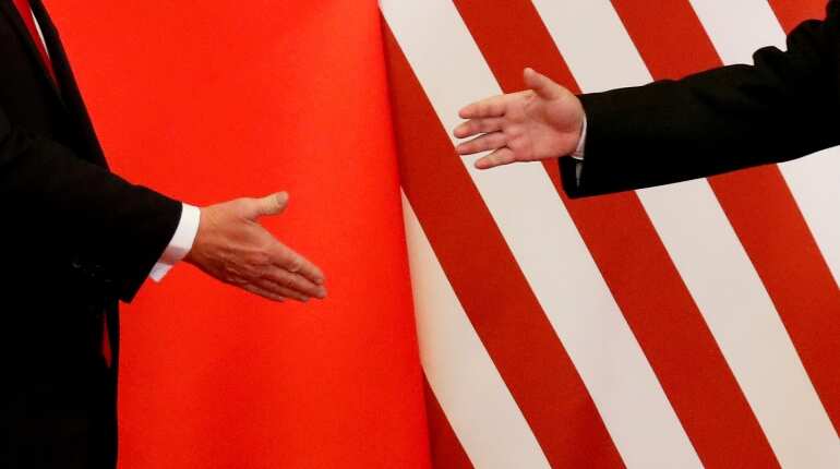 US and China said to appear close to deal to roll back tariffs