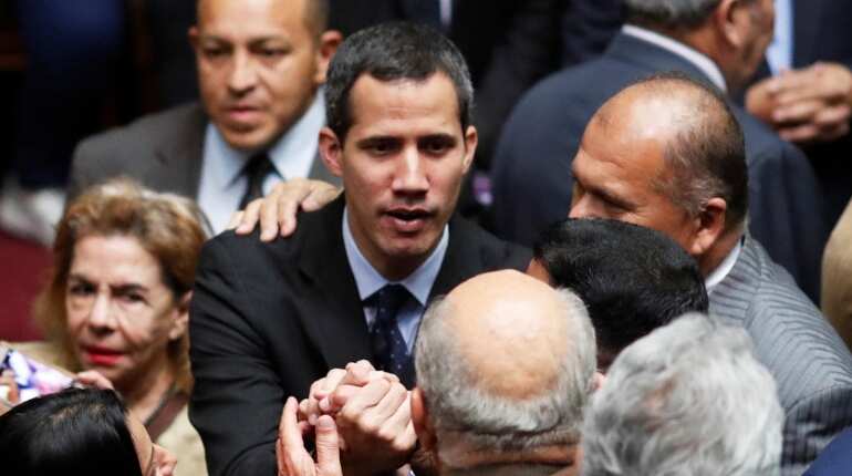 Venezuela bars Juan Guaido from leaving country, freezes his bank accounts