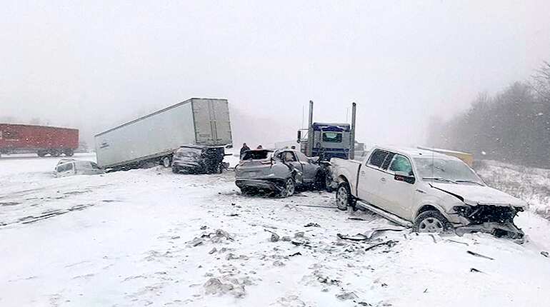 Officials advise residents to stay off roads after snow causes accidents on roads in US Midwest storm
