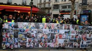French 'yellow vests' march through Paris denouncing police violence
