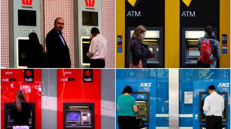 Australia cuts rates to historic low as economy slows