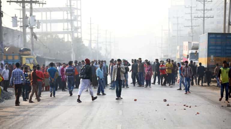 Bangladesh suppliers to H&M, Next lay off workers after wage protests