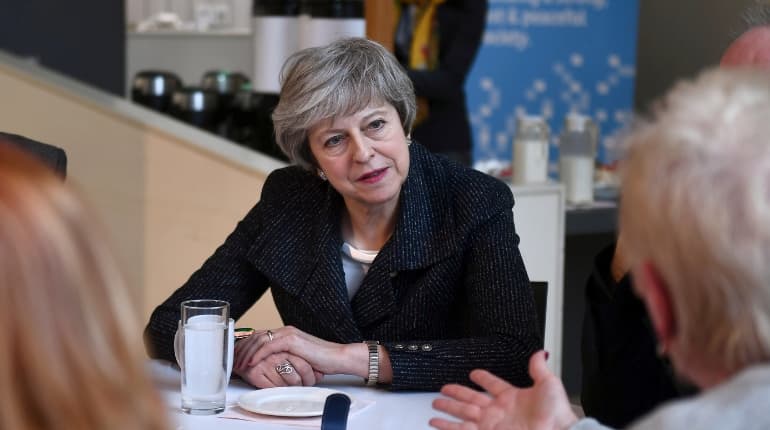 British PM May takes demand for Brexit renegotiation to Brussels