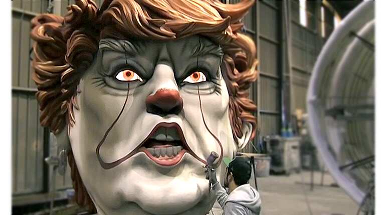 Clown-faced politicians and cinema mix at Nice Carnival