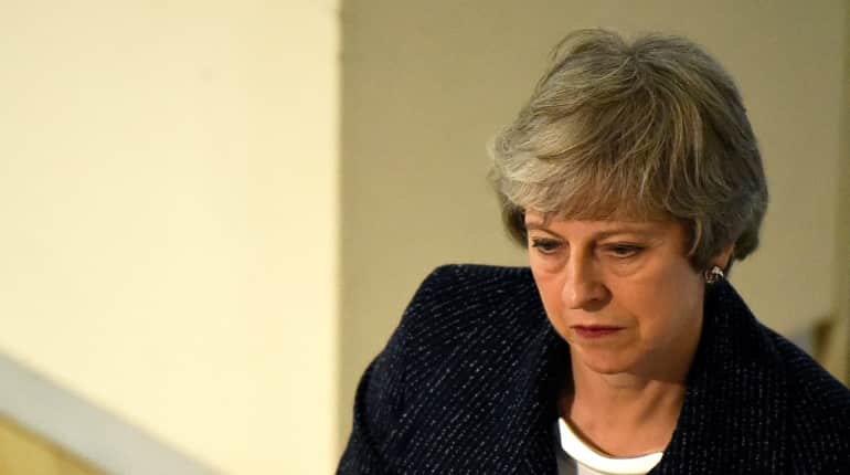 British PM Theresa May quits as party leader; triggers succession race