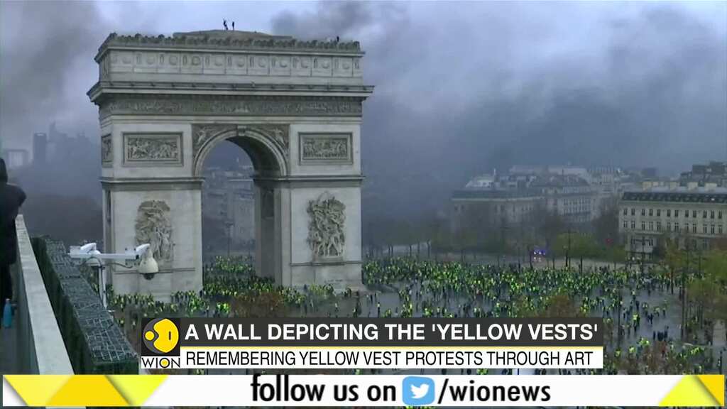 Paris street artists bring splash of colour into 'yellow vest' crisis
