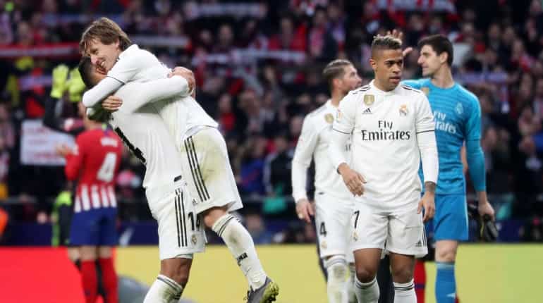 Real win Madrid derby to muscle into title race Real win Madrid derby to muscle into title race
