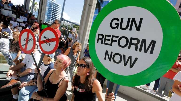 Trump says White House discussing gun legislation; Democrats say talks low-level