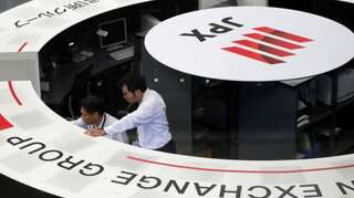 Asian shares near seven-month highs, investors pause for breath