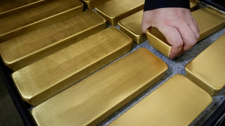 Gold hits two-week low as upbeat US data lifts dollar Gold hits two-week low as upbeat US data lifts dollar