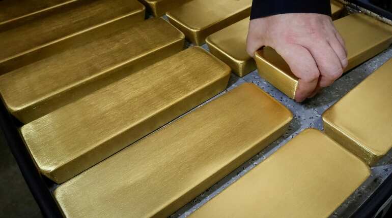 Gold steady as firmer dollar offsets growth concerns
