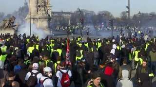 French police fire tear gas as latest 'yellow vest' protests turn violent