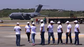 More US aid for Venezuela touches down in Colombia