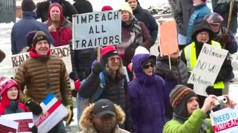 Trump's emergency declaration sparks protests outside White House