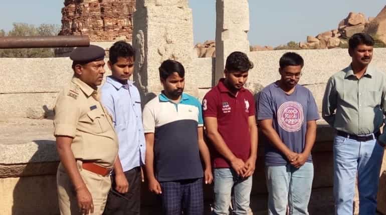 Hampi vandalised: Four fined Rs 70,000 each, made to put pillars back up Hampi vandalised: Four fined Rs 70,000 each, made to put pillars back up