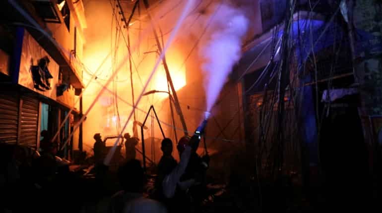 Dhaka fire: Death toll rises to 70, officials say body count could go up still further Dhaka fire: Death toll rises to 70, officials say body count could go up still further