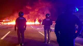 Catalonia protesters burn tires, block highways over separatist trial
