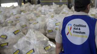 Venezuela aid from US lands in Curacao