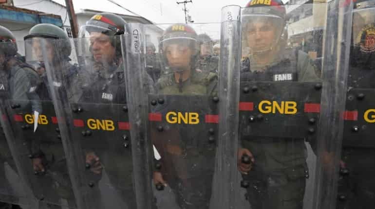 China, Russia urge against military action in Venezuela