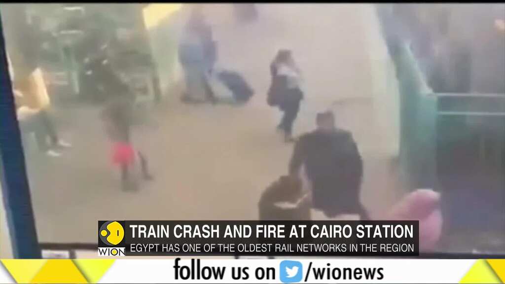 Dozens killed and injured in crash and fire at Cairo train station