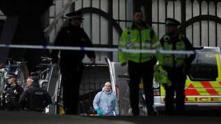 UK police link small bombs sent to London airports and rail hub