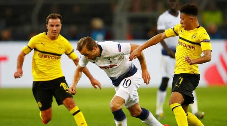 Harry Kane scores in Dortmund as Tottenham stroll into last eight Harry Kane scores in Dortmund as Tottenham stroll into last eight