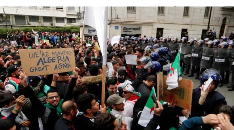Tens of thousands hit streets in Algeria for anti-Bouteflika protest Tens of thousands hit streets in Algeria for anti-Bouteflika protest
