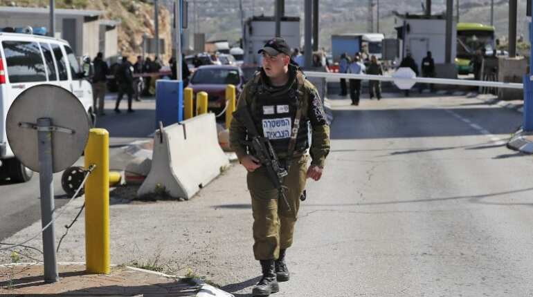Israel court sentences three soldiers for assault on Palestinians